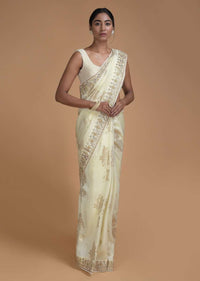 Cream White Saree In Silk With Weaved Floral Motifs In Repeat Pattern Online - Kalki Fashion