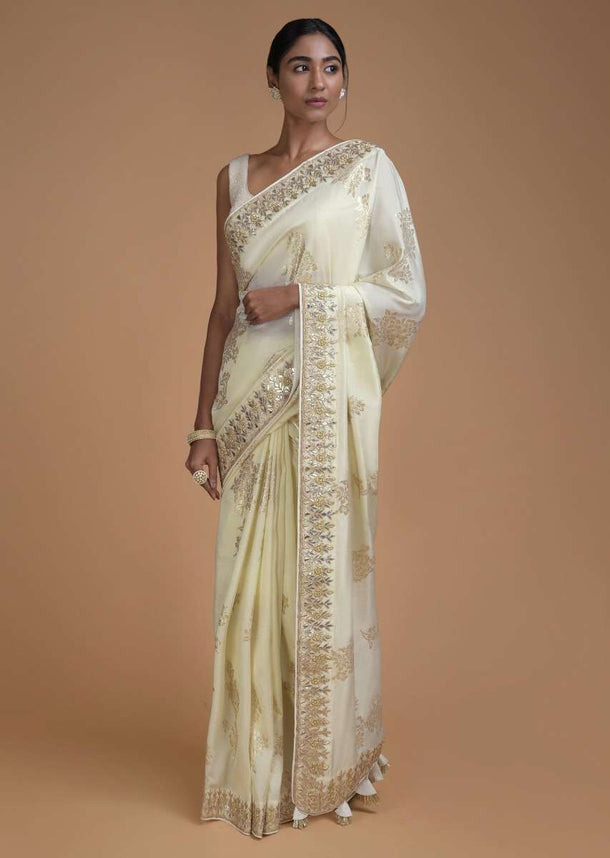 Cream White Saree In Silk With Weaved Floral Motifs In Repeat Pattern Online - Kalki Fashion