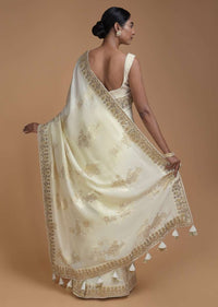 Cream White Saree In Silk With Weaved Floral Motifs In Repeat Pattern Online - Kalki Fashion