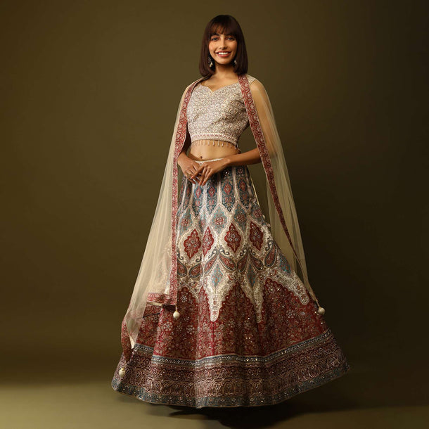 Cream And Maroon Shaded Lehenga Choli In Raw Silk With Floral And Mughal Print And Mirror Work