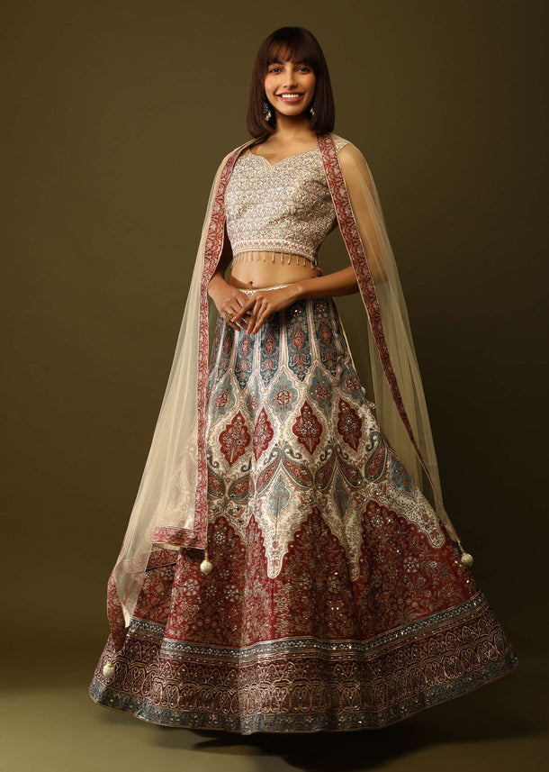 Cream And Maroon Shaded Lehenga Choli In Raw Silk With Floral And Mughal Print And Mirror Work