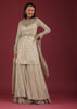 Cream Palazzo And Kurta In Sequins Embroidery, Pants Are Crafted In A Net With Frills On The Bottom