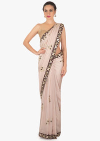 Cream peach saree in silk with gotta patch and resham embroidered butti only on Kalki