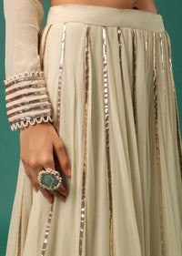 Cream White Embroidered Lehenga Set With Peplum Top In Georgette