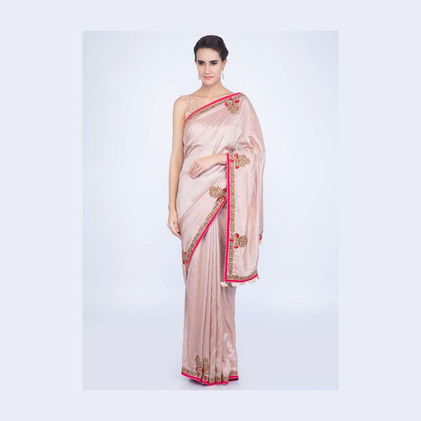 Creamish peach silk saree with contrasting red embroidered border only on Kalki