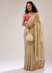 Creme Brulee Saree In Dupion Silk With Multi Colored Bud Embroidered Floral Buttis And Heavy Pallu Design