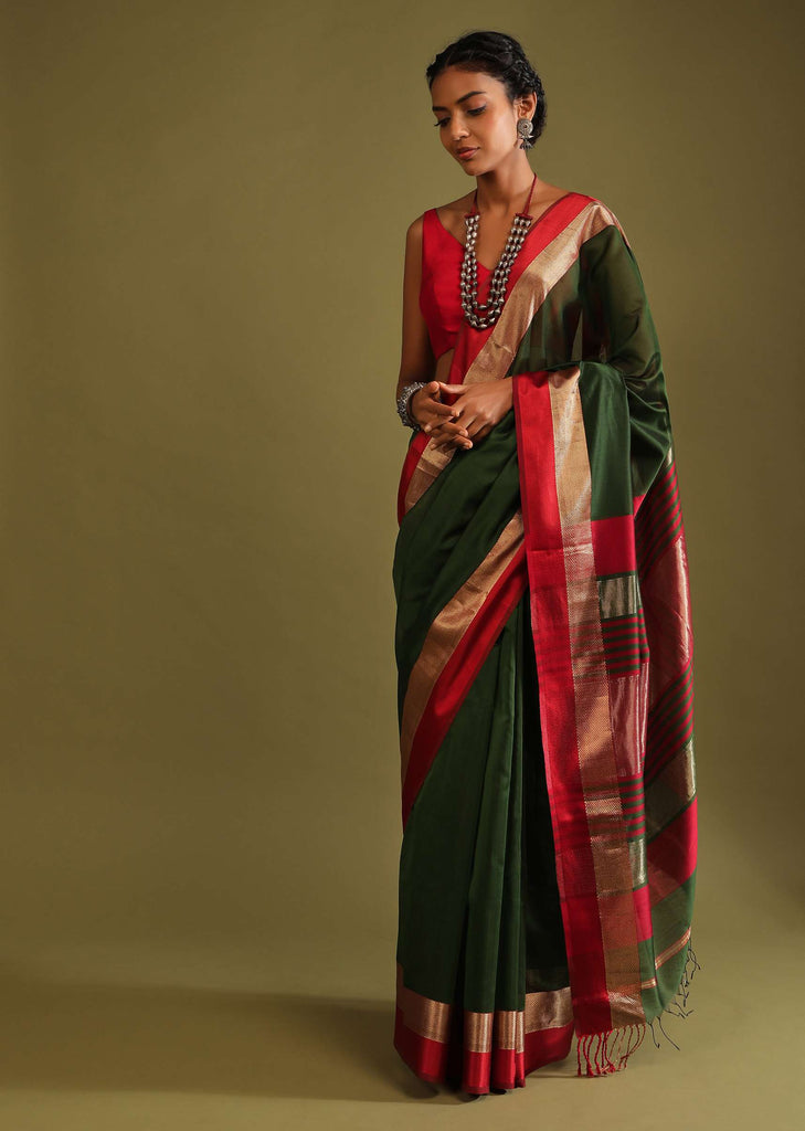 Cypress Green Saree In Tussar Silk With Gold And Red Woven Border And Striped Pallu Design