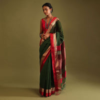 Cypress Green Saree In Tussar Silk With Gold And Red Woven Border And Striped Pallu Design