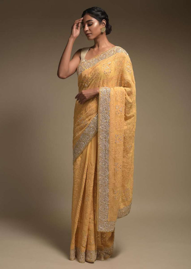 Dandelion Yellow Saree In Georgette Adorned With Lucknowi Thread Embroidery In Floral Jaal Online - Kalki Fashion