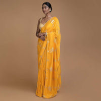 Dandelion Yellow Saree In Silk With Weaved Floral Motifs In Repeat Pattern