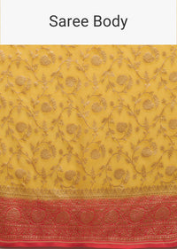 Canary Yellow Traditional Georgette Saree With Orange Brocade Border And Jaal Work