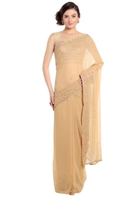 Dark beige saree adorn in gold and silver kundan embroidery only on Kalki