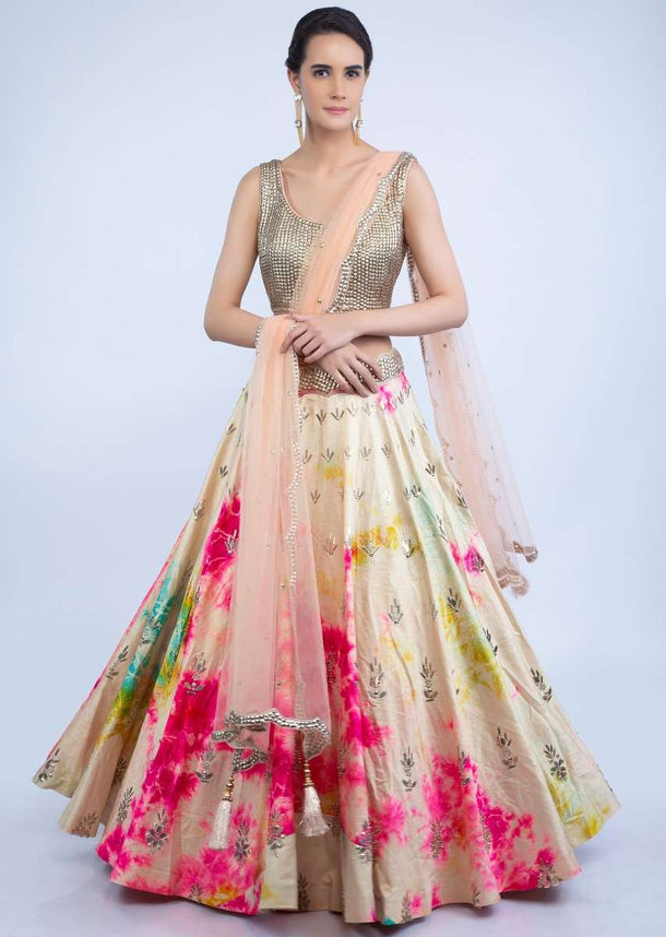 Dark Cream Tie And Dye Lehenga With Metallic Bead Studded Blouse And Peach Net Dupatta Online - Kalki Fashion