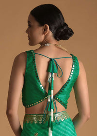 Dark Green Blouse In Raw Silk With Mirror Work And Open Back With Tassel Dori Tie Ups