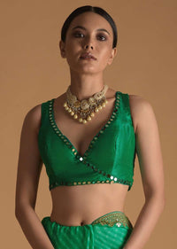 Dark Green Blouse In Raw Silk With Mirror Work And Open Back With Tassel Dori Tie Ups