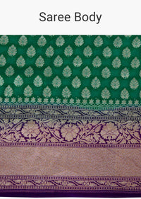 Dark green georgette saree with weaved butt