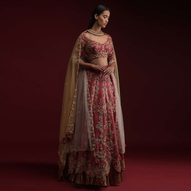 Dark Rani Pink Lehenga Choli In Raw Silk With Hand Embossed Embroidery Work In Floral And Honeycomb Motifs Online - Kalki Fashion