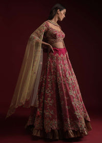Dark Rani Pink Lehenga Choli In Raw Silk With Hand Embossed Embroidery Work In Floral And Honeycomb Motifs Online - Kalki Fashion