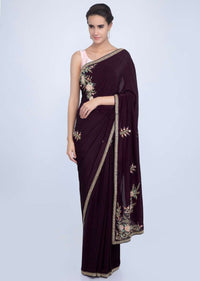 Dark violet satin crepe saree with embroidered butti and border only on Kalki