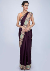 Dark violet silk saree with butti and heavy embroidered border only on Kalki