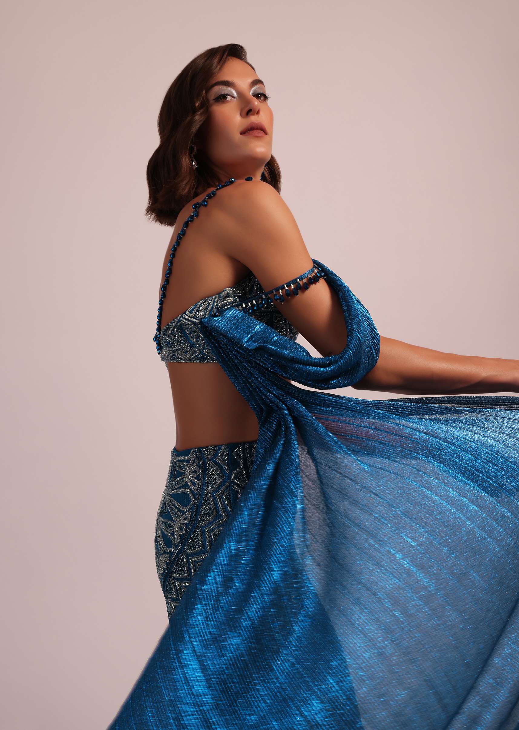 Dark Blue Fish Cut Bridal Lehenga Set In Net With Attached Cape