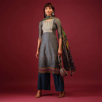 Dark Blue Palazzo Suit In Tussar Silk With A Stunning Potli Bag And Digital Print Dupatta