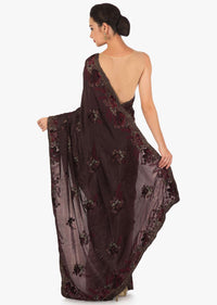 Dark brown saree in crepe with resham embroidery in floral motif only on Kalki