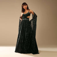 Dark Green Gown Embellished In Sequins With A Velvet Bodice Adorned In Hand Embroidery And Cape On The Shoulder Online - Kalki Fashion