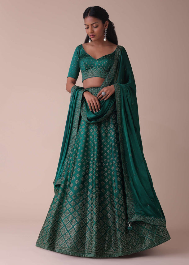 Deep Green Wrinkle Satin Lehenga Embellished In Swarovski