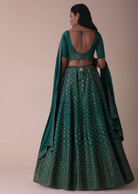 Deep Green Wrinkle Satin Lehenga Embellished In Swarovski