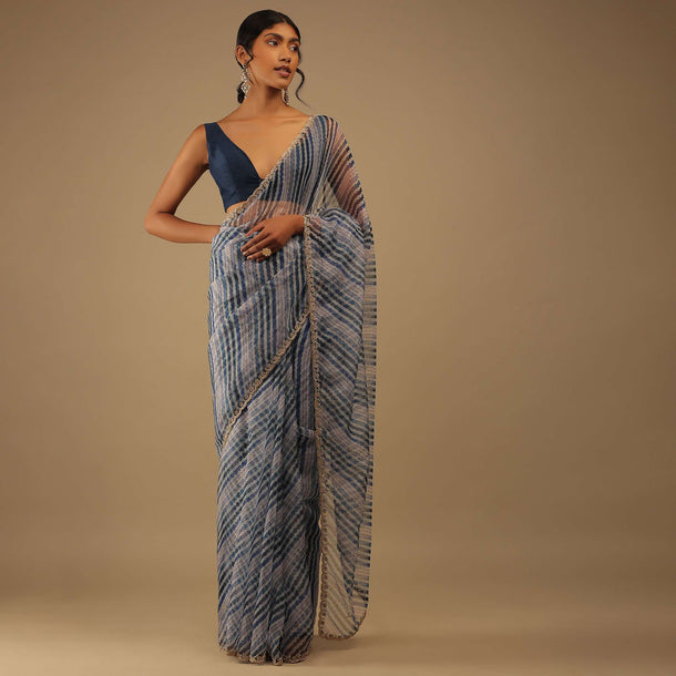 Deep Marine Blue And Black Leheria Print Saree In Moti Embroidery, Crafted In Organza With Moti Embroidery Floral Buttis