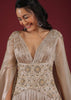 Doe Organza Gown With A Long Extended Cape Sleeves And A Plunging V Neckline