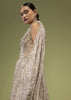 Doe Gown With A Long Cape In Sequins Embroidery, Crafted In Sleeveless With A V Neckline And A Side Zip Closure