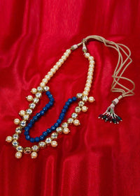 Double layer necklace adorn with cream pearls, kundan stone and round blue beads only on kalki