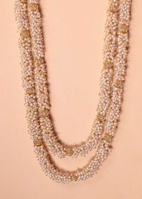 Double Layered Pearl Necklace With Carved Beads And Matching Jhumkas Online - Kalki Fashion