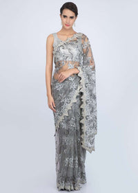 Dove grey hard net saree in floral jaal embroidery only on Kalki