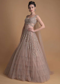 Tejasswi Prakash Shell Champagne Lehenga Choli In Hand Embellished Net With Floral Pattern And Attached Net Cape