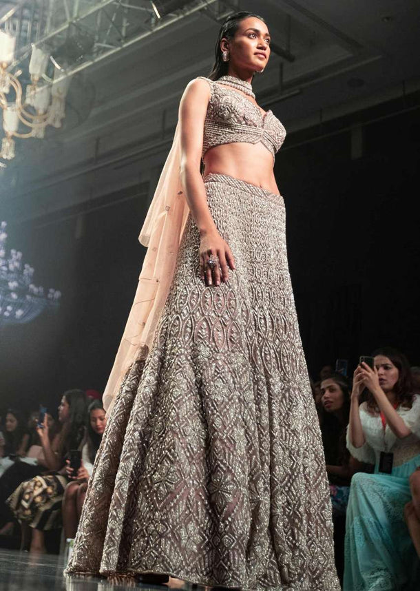 Eve Champagne Lehenga Choli With Cut Dana Work And Embellished Choker With Attached Dupatta