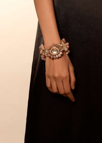 Dusty Peach Bracelet With Semi Precious Stones In Floral Motifs Along With Kundan Centre Edged In Swarovski