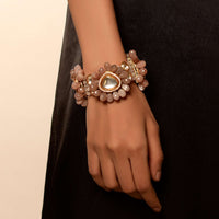 Dusty Peach Bracelet With Semi Precious Stones In Floral Motifs Along With Kundan Centre Edged In Swarovski