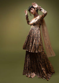 Dusty Peach Sharara Suit In Satin With A Front Slit Peplum Kurti And Moti Accented Waistline