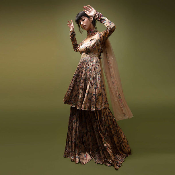 Dusty Peach Sharara Suit In Satin With A Front Slit Peplum Kurti And Moti Accented Waistline