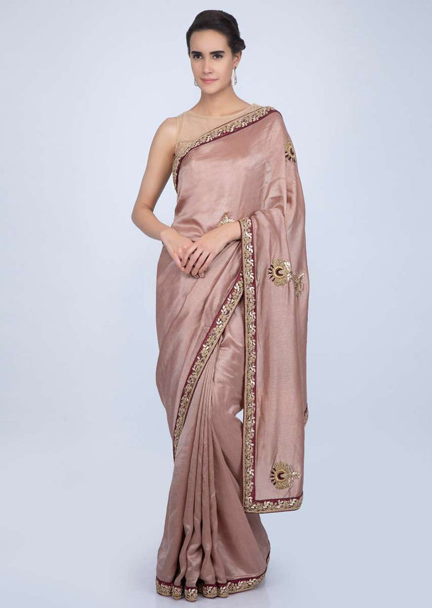 Dusty rose pink tussar silk saree with embroidered butti and border only on Kalki