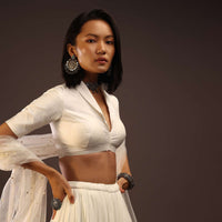 Egret White Half-Sleeved Blouse With Long Collar Neckline. Front Hook Closure With A Straight Hemline.