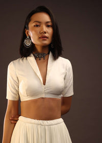 Egret White Half-Sleeved Blouse With Long Collar Neckline. Front Hook Closure With A Straight Hemline.