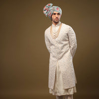 Pearl White Silk Sherwani Set With Exquisite Zari And Sequin Embroidery