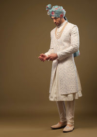 Pearl White Silk Sherwani Set With Exquisite Zari And Sequin Embroidery