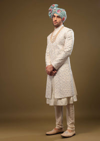 Pearl White Silk Sherwani Set With Exquisite Zari And Sequin Embroidery