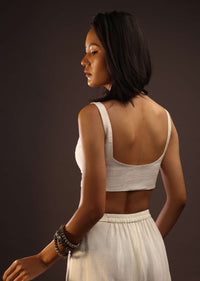 Egret White Sleeveless Blouse With A Sweetheart Neckline. Padded With A Back Hook Closure