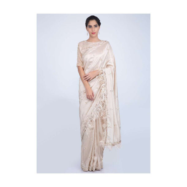 Ivory Saree With Embroidery And Feathers On The Border Online - Kalki Fashion